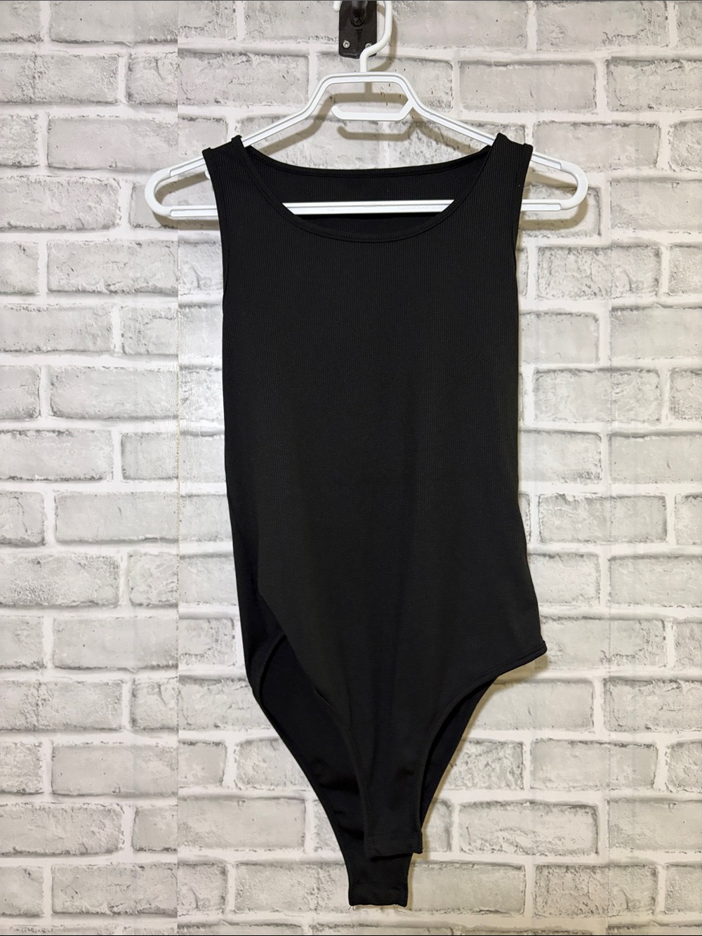 SHEIN Black Sleeveless One‑Piece Bodysuit, small